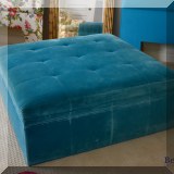 F84. Large turquoise velvet cocktail ottoman. 